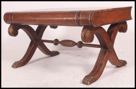 A 20th century large coffee /  occasional table in the form of a book having spine drawer being