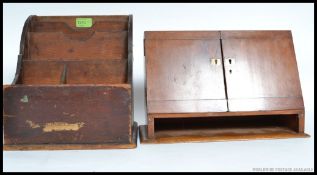 An Industrial oak desk top stationary cabinet with sectioned interior together with a chemists