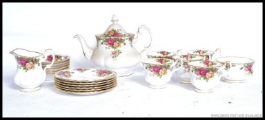 A collection of Royal Albert Country Roses bone china, to include a teapot,