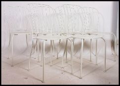 A set of 6 contemporary Ikea painted metal garden chairs with white finish.