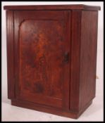An early 20th century country pine side cupboard.