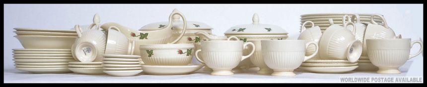A Wedgwood Moss Rose part tea / dinner service to include cups, saucers, plates, bowls,
