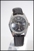 A 1960's gentlemans vintage Oris black face wristwatch.