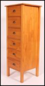 A tall good quality large pine upright pedestal chest of drawers.
