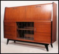 A retro 1970's walnut cocktail - drinks cabinet.