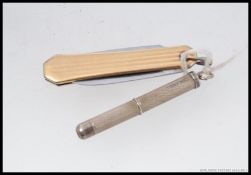 A silver hallmarked tooth pick, Birmingham, 1957,