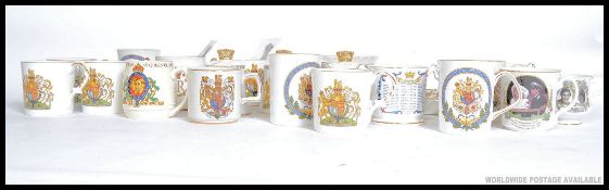 An extensive collection of commemorative wares to include cups and saucers, loving cups,
