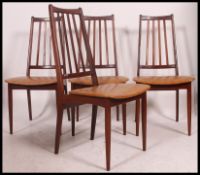 Set of 4 mid 20th century Danish teak dining chairs. This set is in outstanding original condition.