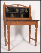 An Edwardian walnut and marble top washstand - side table.