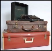 A vintage Corona typewriter complete in the original case together with a good leather vintage