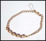 A 9ct gold curb link chain bracelet,