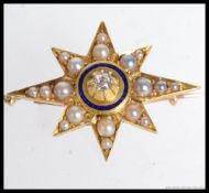 A Victorian 18ct gold, diamond and seed pearl star brooch.