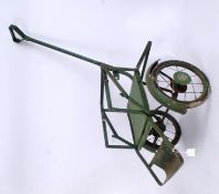 SILVER CROSS: A vintage 1950's Silver Cross childs pull or pushalong buggy / cart.