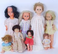 DOLLS: A collection of assorted vintage plastic and vinyl dolls - most with clothing.
