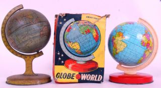 GLOBES: Two vintage tinplate children's globes.