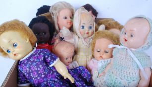 DOLLS: A collection of 15x vintage plastic and vinyl dolls, with clothing.