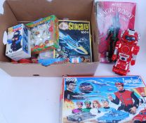 TOYS & GAMES: A box of assorted vintage toys and games to include jigsaws ( Captain Scarlet,