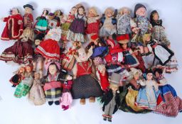 DOLLS: A HUGE collection of assorted vintage 1960's tourist / National dolls - likely around 150 in