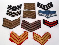 UNIFORM STRIPES: A collection of 10x assorted military uniform Colonel / Sergeant / etc stripes.