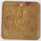 An original WWII Second World War issue Nazi Third Reich Gestapo Warrant disc / tag.