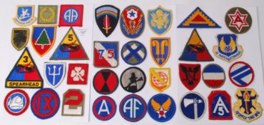 A collection of 3x WWII Second World War US Army cloth badges