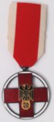 A Third Reich / Nazi second world war WWII era Red Cross Medal.