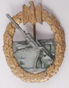 A WWII Second World War era Nazi Third Reich German Kriegsmarine Coastal Artillery uniform badge.