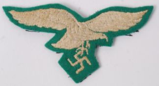 A WWII Second World War era Nazi Third Reich German Police cloth tunic eagle patch.