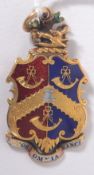 A rare 18ct gold and enamel set pendant medal adorned with the light infantry coat of arms with