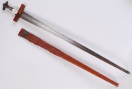 A 19th century Sudanese Kaskara sword with leather bound grip, cruciform crossguard,