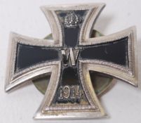 A German Nazi WWI Iron Cross, 1st Class. Complete with screwing back plate. Dated 1914 to cross.
