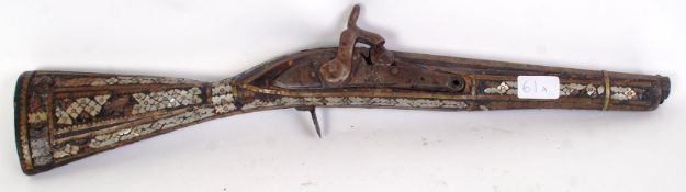 An early 19th century Ottoman mother of pearl musket.