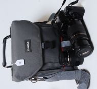 An original Canon EOS 1000F N SLR 35mm camera, complete with 2x lenses - 75-300mm and 35-80mm.