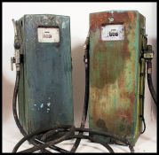 GILBARCO PETROL PUMPS: A pair of vintage original garage forecourt Gilbarco petrol pumps.