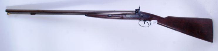 A 19th century percussion cap side by side shotgun by R. Chaplain.
