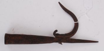An 18th century cast Iron Anglo - Indian Anka (steering wheel ) Applied to a long pole for guiding
