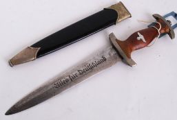 A German Third Reich SA dagger by Solingen, decorated with eagle and swastika to handle.