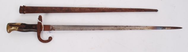 BAYONET: An original WWI First World War issue rifle bayonet, within the original scabbard case.