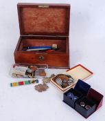 A military ribbon brooch bar having a bronze oak leaf for those mentioned in despatches.