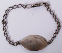 A silver hallmarked World War One Royal Flying Corp - RFC bracelet ID tag for Douglas D