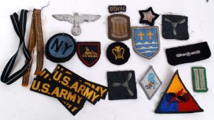 A collection of WWII / World War Two military cloth insignia recondition patches to include RAF