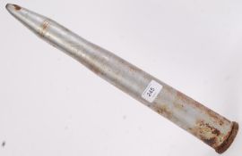 A large deactivated AKAK Bofors Gun 40mm shell, with notation to base.