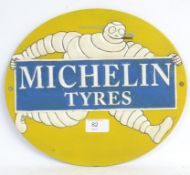 MICHELIN MAN: A vintage style reproduction Michelin Man metal sign,
