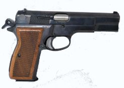 A Browning FM Hi Power 9mm semi automatic pistol by FEG. Deactivated, with certificate (dated 2000).