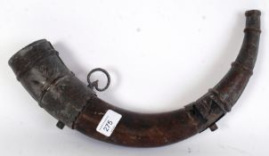 An 18th century Ottoman Empire powder horn. The horn with applied brass chase worked banded details.