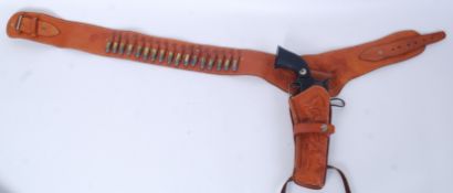 A 20th century leather tooled reenactment / cowboy gun holster belt, well detailed.