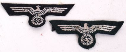 GERMAN PATCHES: A pair of Nazi Swastika / German uniform arm patches.