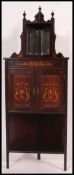 An Edwardian rosewood and marquetry inla