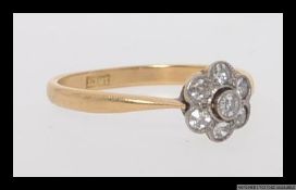An 18ct gold and diamond ring with 7 4pt