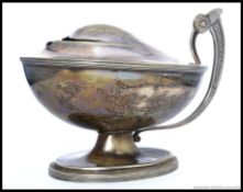 A vintage silver plated hand held oil bu